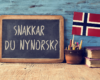 blackboard with Norwegian language course for nursing in Norway